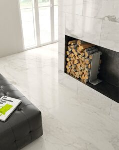 Floor and fireplace with white/cream/gray marble look tile